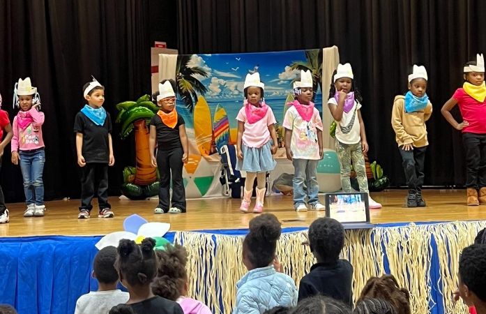  Our Students Sing, Dance, Rap, and Recite Poems for the Talent Show.